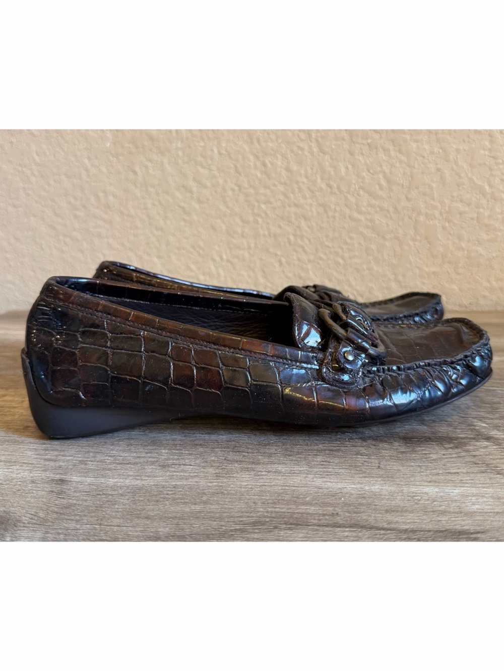 Stuart Weitzman crocodile-embossed patent leather loafers